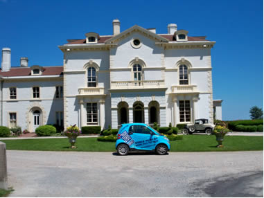 Smart Car in front of “Beechwood” Newport, RI